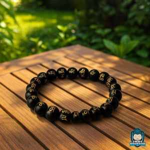 Bracelet-Onyx-Mantra-Tibetain-perles-noires-polies-La-Maison-de-Bouddha