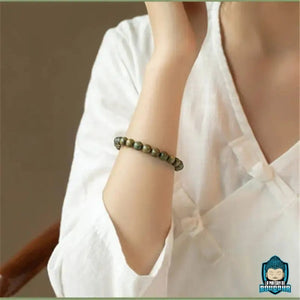 Bracelet-en-Bois-de-Santal-Vert-Perles-naturelles-polies-de-serenite-et-d-harmonie-La-Maison-de-Bouddha