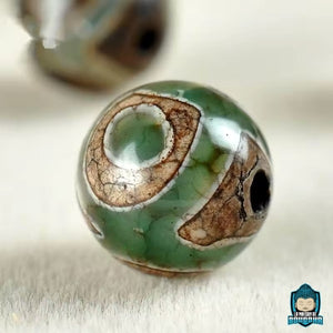 Bracelet-tibetain-en-perles-Dzi-Talisman-de-protection-et-prosperite-bouddhiste-perles-naturelles-agate-La-Maison-de-Bouddha