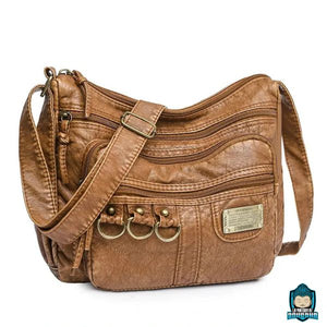 Sac-Bandouliere-en-Cuir-Brun-Cannelle-pour-Femme-cuir-PU-souple-design-moderne-anneaux-et-plaque-dorés-décoratifs-taille-réglable-La-Maison-de-Bouddha