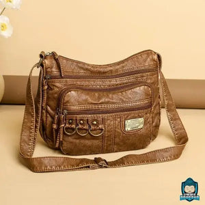 Sac-Bandouliere-en-Cuir-Brun-Cannelle-pour-Femme-cuir-PU-souple-sangle-ajustable-multiples-poches-La-Maison-de-Bouddha
