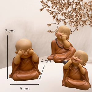 Dimensions d'une statuette du trio de petits moines bouddhistes : environ 7 x 5 x 4 cm
