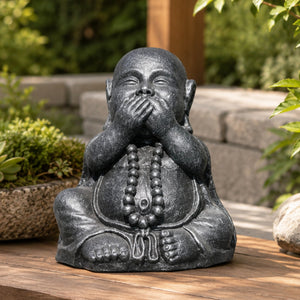 Bouddha rieur chinois de la sagesse gris antique symbolisant ne rien dire en décoration extérieure