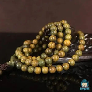 Bracelet mala tibétain de 108 perles en bois de santal  La Maison de Bouddha