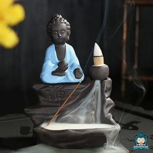 Brule-Encens-Bouddha-Noir-en-ceramique-robe-coloris-bleu-taille-environ-hauteur-9-cm-longueur-12-cm-largeur-6-cm-poids-470-grammes