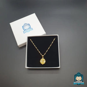 Petit Pendentif Bouddha Doré  La Maison de Bouddha