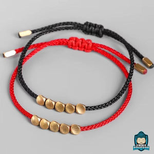 Bracelet-Tresse-Tibetain-Rouge-et-Perles-de-Cuivre-Noir-et-Rouge-La-Maison-de-Bouddha