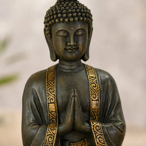 Statue Bouddha en Résine – 40 cm gros plan du visage de la statue bouddhiste en résine La Maison de Bouddha