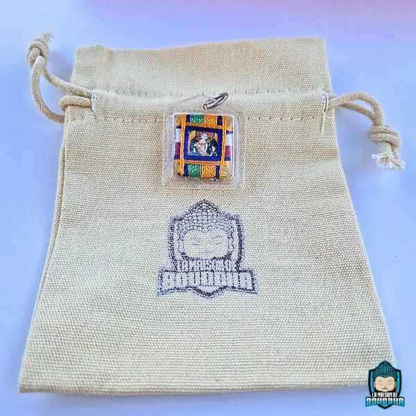 Amulette Tibetaine Bodhisattva Vajrasattva Sungkhor Goh Sung avec ca pochette en lin