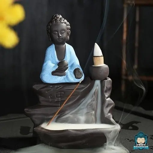 Brule-Encens-Bouddha-Noir-en-ceramique-robe-coloris-bleu-taille-environ-hauteur-9-cm-longueur-12-cm-largeur-6-cm-poids-470-grammes