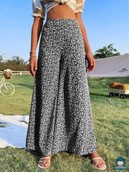 Pantalon-ample-fluide-taille-haute-imprime-floral-Noir-en-polyester-et-elasthanne-coupe-large-vue-de-devant