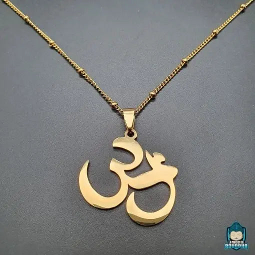 Pendentif-Aum-Dore-en-acier-inoxydable-chaine-maille-gourmette-couleur-or-perles-dorees-La-Maison-de-Bouddha