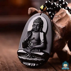 Pendentif-Bouddha-Noir-en-obsidienne-perles-rondes-noires-collier-Bouddha-assis-mudra-abhaya-croix-svastika-La-Maison-de-Bouddha
